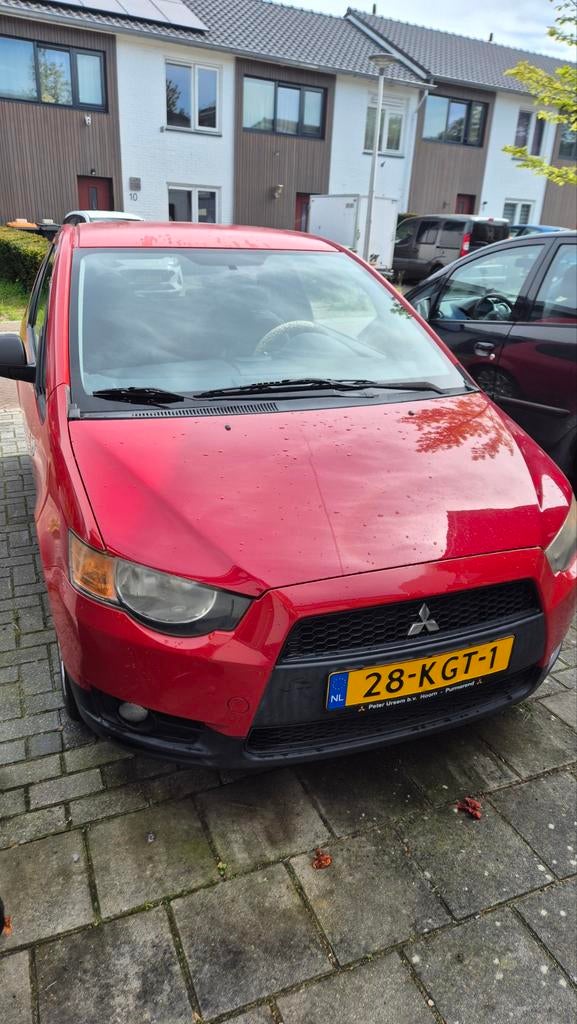 Mitsubishi Colt 1.3 3-DR 2009 Rood, Auto's, Voorwielaandrijving, Stof, Colt, Origineel Nederlands