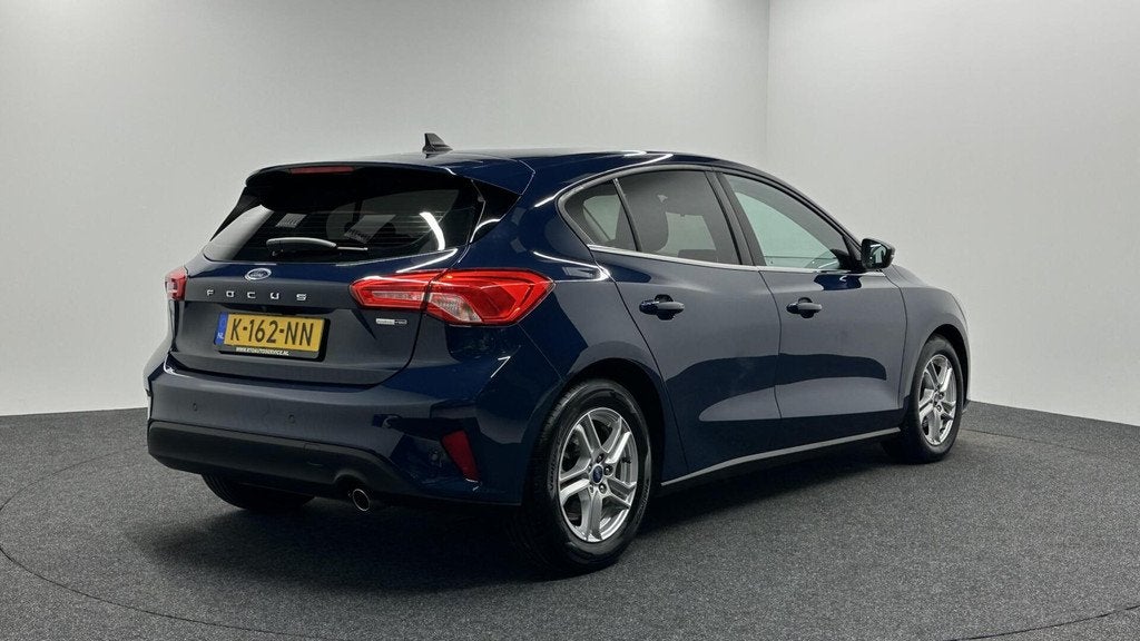Ford Focus 1.0 EcoBoost Hybrid Trend Edition Business CAMERA, Stof, Gebruikt, Met garantie (alle), Blauw