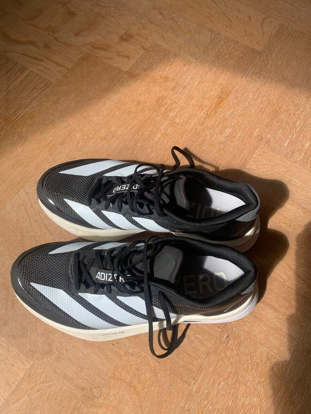 Adizero Boston 13 hardloopschoenen 42 2/3, Ophalen of Verzenden, Zo goed als nieuw, Sportschoenen, Zwart