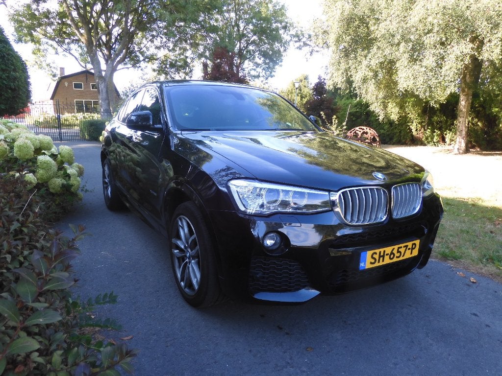 Prachtige zwarte BMW X4 , 2.8i X drive uit 2017 met 96000 km, Automaat, Zwart, 4 cilinders, 2000 kg