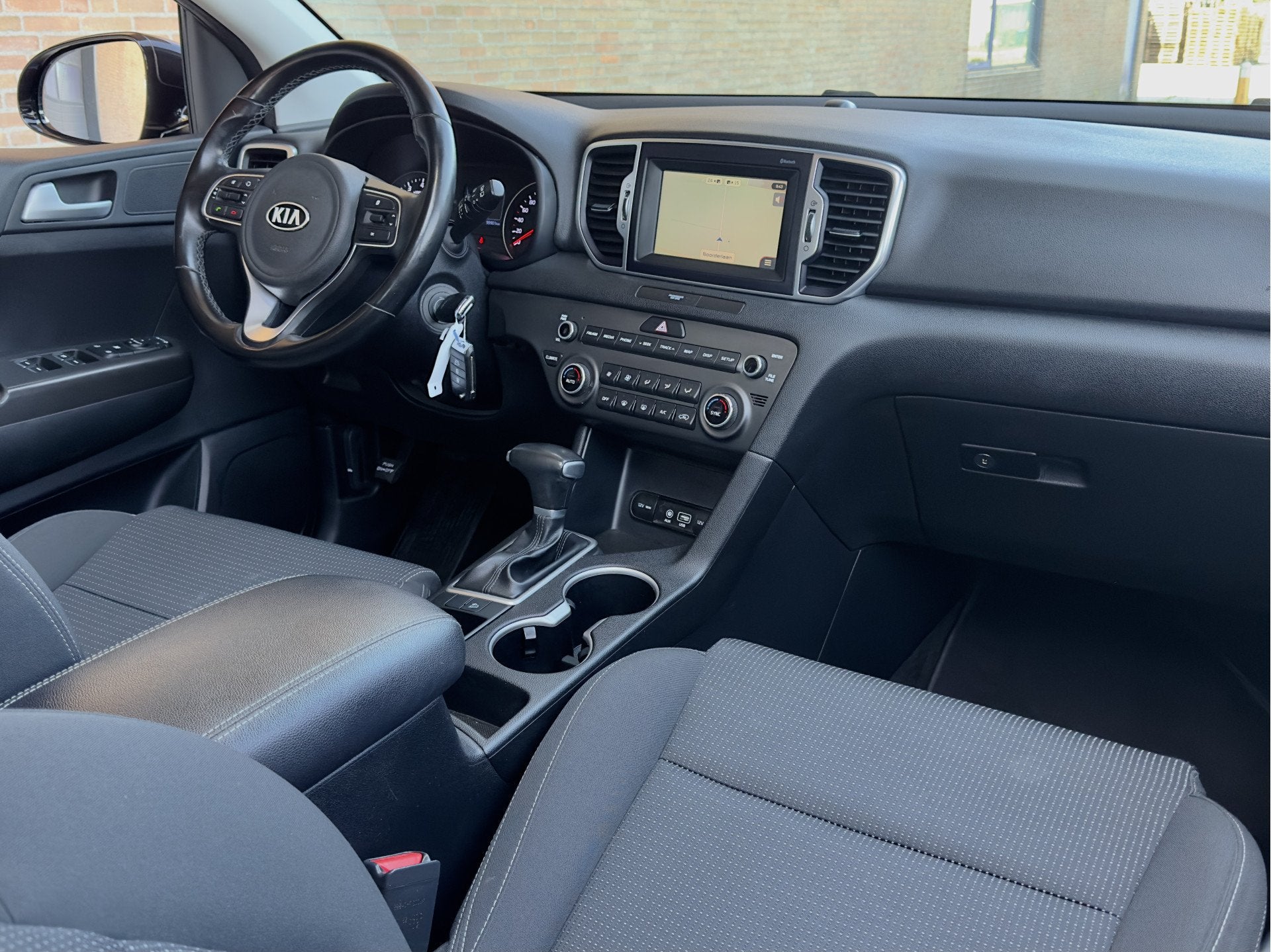 Kia Sportage 1.6 GDI AUT6 EXECUTIVE 93D.KM! PANODAK NAVI CAM, Auto's, Gebruikt, 4 cilinders, Grijs, 1527 kg