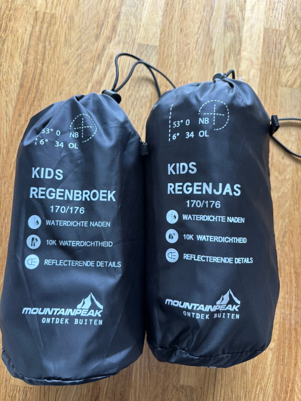 Regenbroek en jas zwart mt 170 / 176, Caravans en Kamperen, Regenkleding, Ophalen of Verzenden, Nieuw, Regenpak, Kinderen