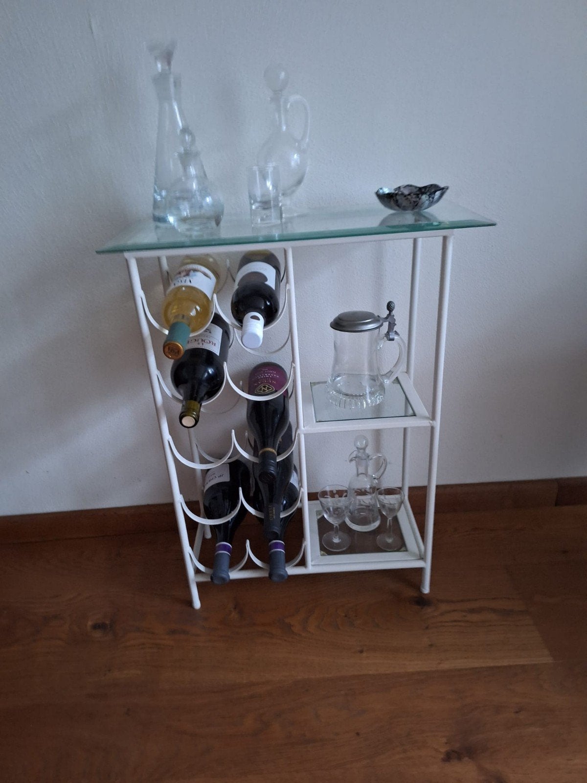 Wijnrek met glazen blad en opbergruimte, Ophalen