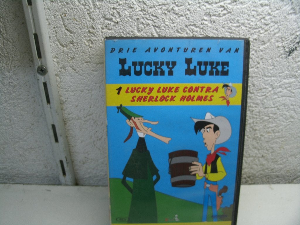 vhs 20a lucky luke 1-3 contra/sherlock holmes, Alle leeftijden, Ophalen of Verzenden, Zo goed als nieuw