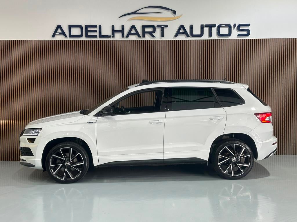 Skoda Karoq 1.5 TSI ACT Sportline Automaat / Panorama dak /, 1295 kg, 4 cilinders, 150 pk, Wit