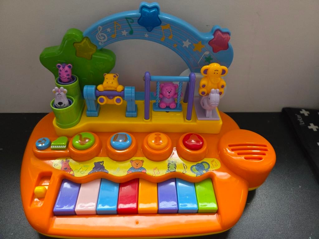 Piano met bewegende diertjes, Ophalen, Zo goed als nieuw