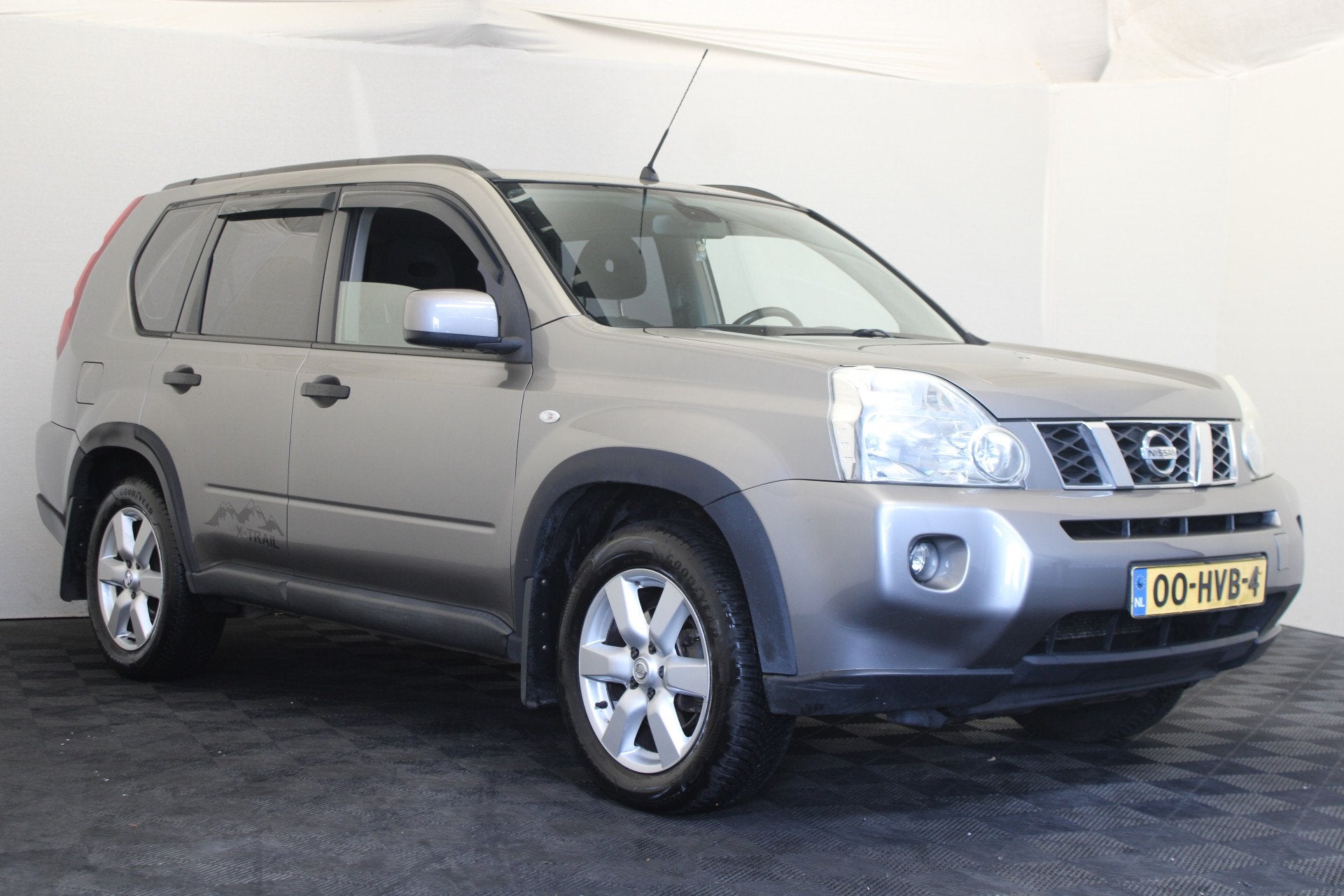 Nissan X-Trail 2.0 XE 4WD (bj 2009), Auto's, Stof, Gebruikt, Zwart, 4 cilinders