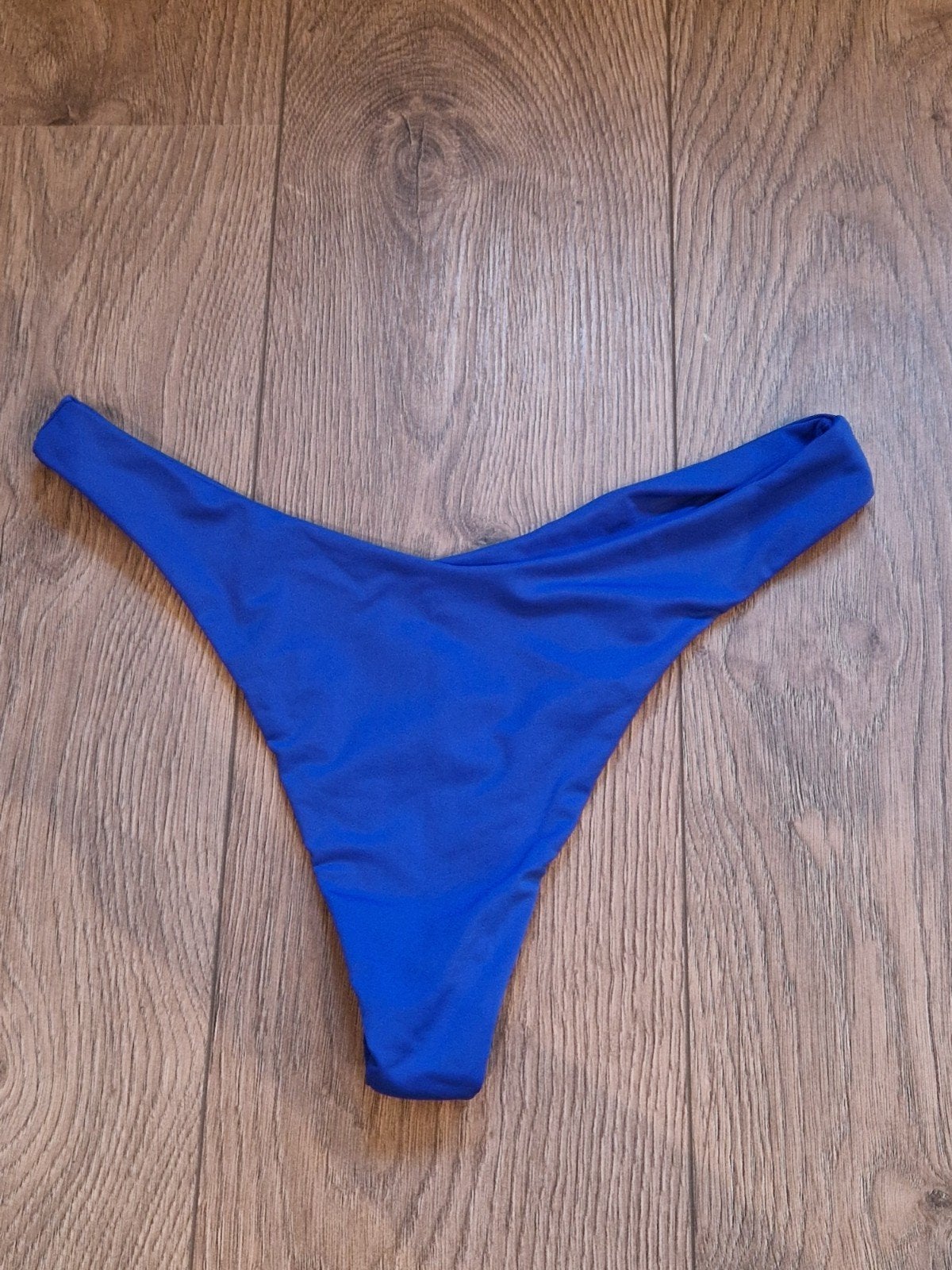 Bikiniebroekje / string maat L, Ophalen of Verzenden, Nieuw, Blauw, Badpak