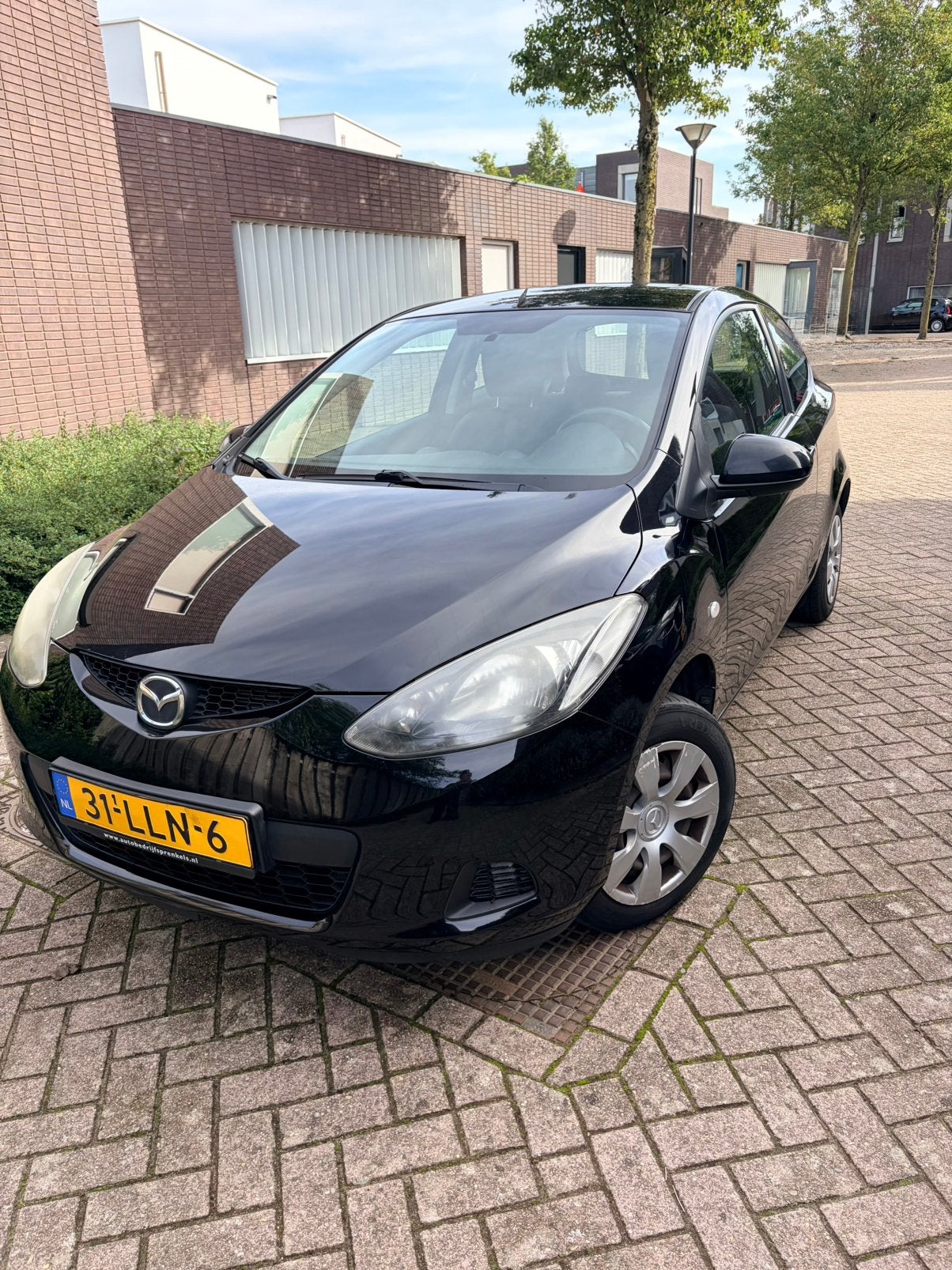 Mazda 2 1.3 75KW 3DRS 2010 Zwart, Auto's, Voorwielaandrijving, 74 pk, 31 €/maand, 4 cilinders