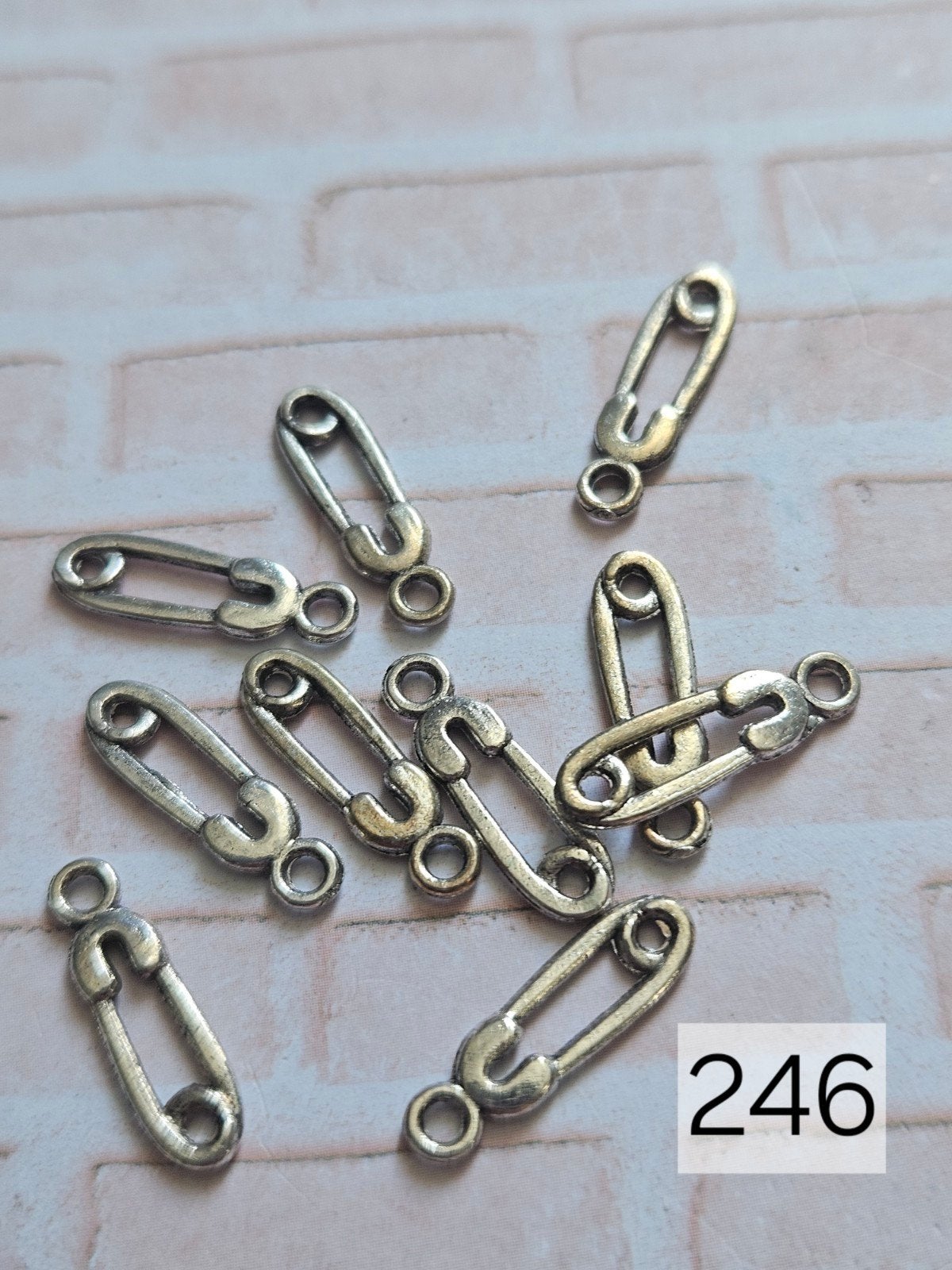 10x Veiligheidsspeld bedels (246), Ophalen of Verzenden, Nieuw