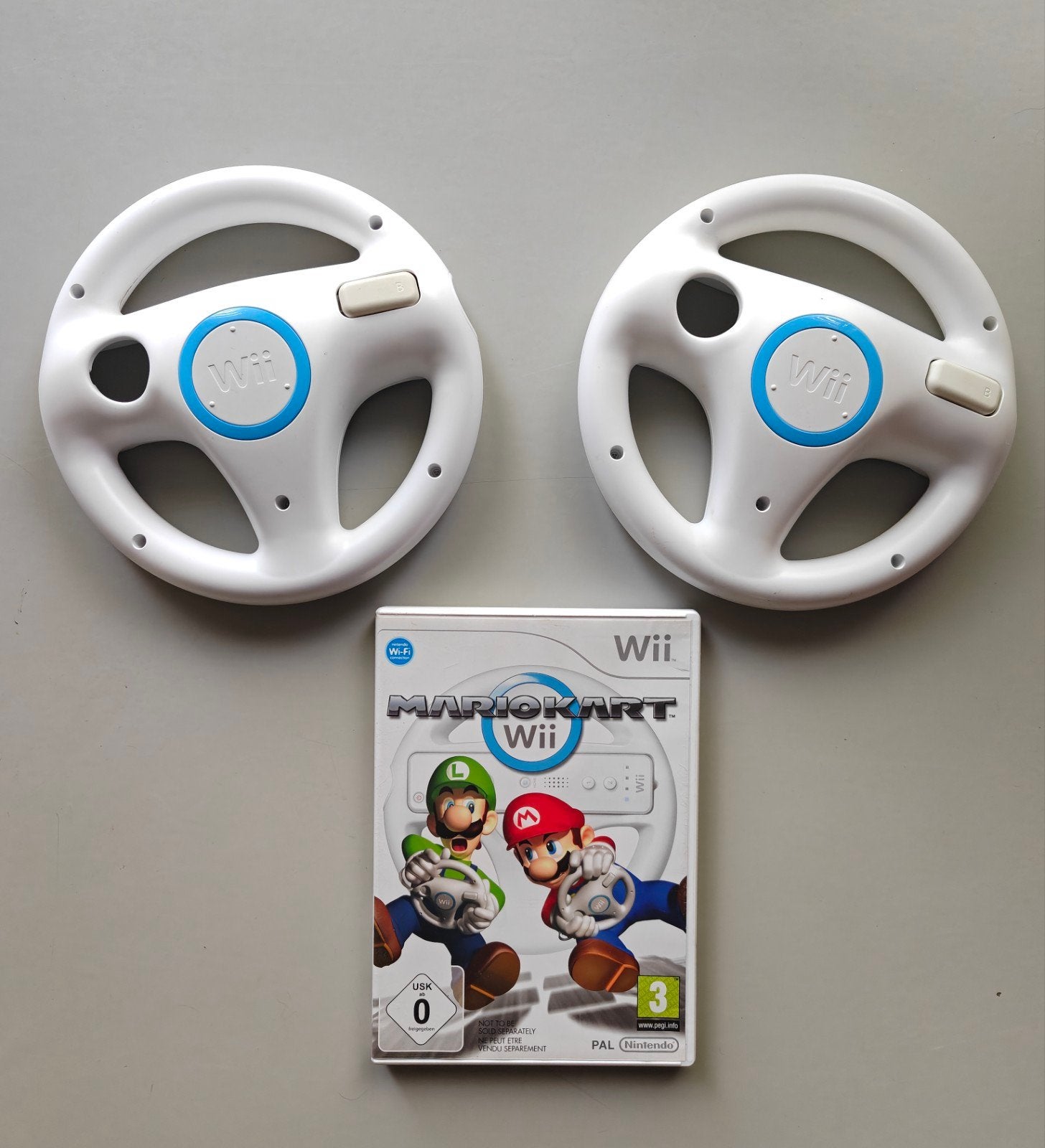 Mario Kart Wii + 2 originele stuurtjes - Nintendo Wii, Spelcomputers en Games, Racen en Vliegen, Eén computer, Ophalen of Verzenden