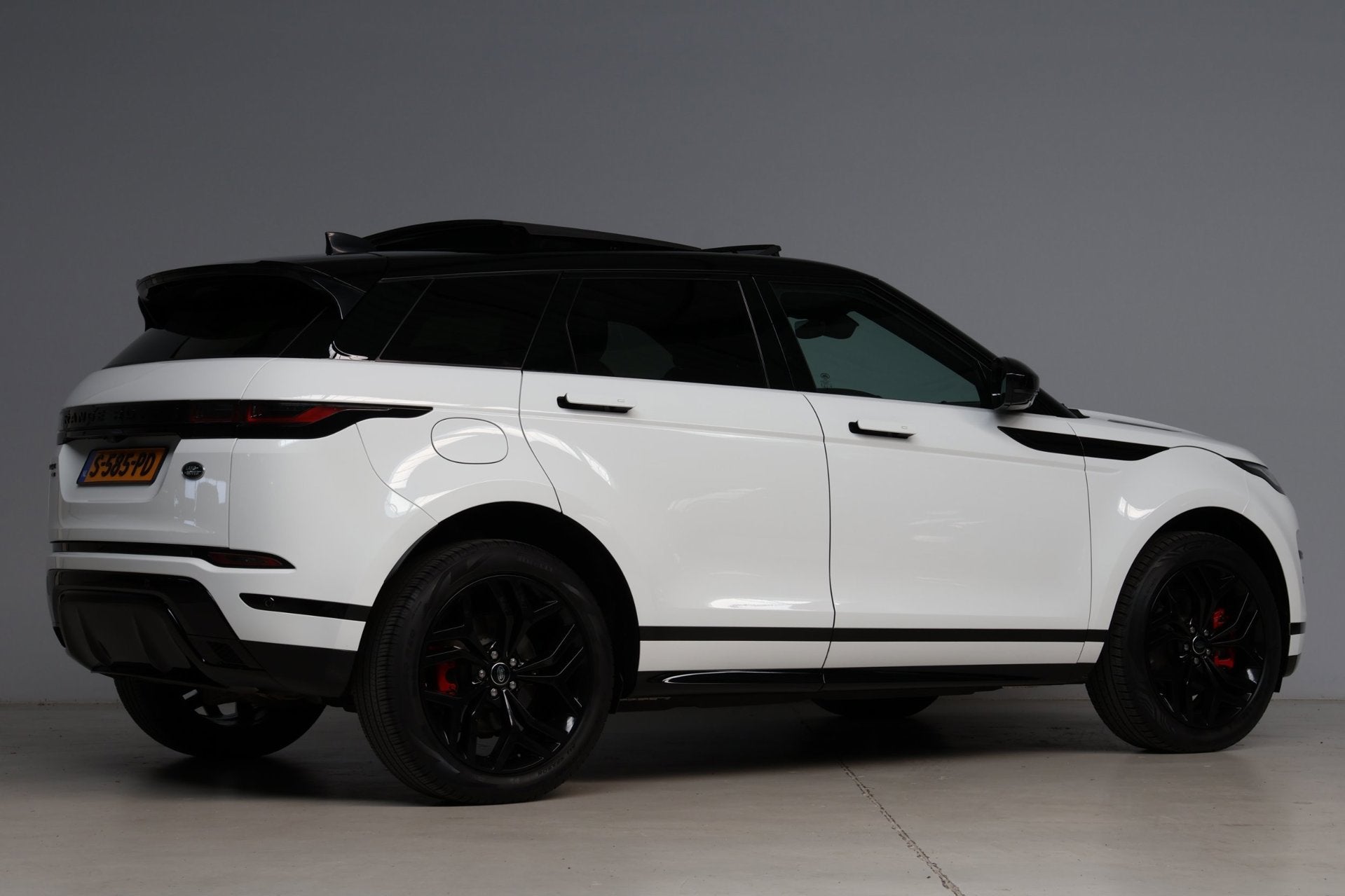 Land Rover Range Rover Evoque 1.5 P300e AWD R-Dynamic HSE Bl, Auto's, Land Rover, Wit, Hybride Elektrisch/Benzine, 147 €/maand