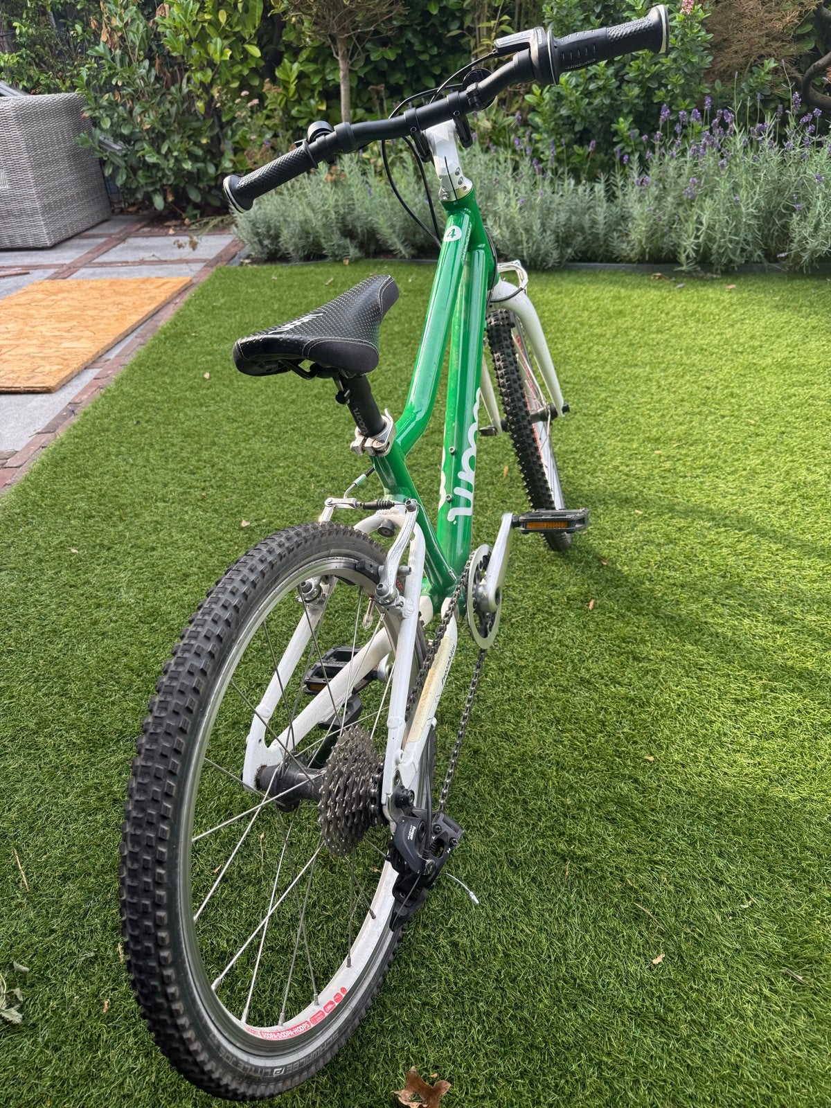 Woom 4 kinderfiets groen - Goed onderhouden, Ophalen, Gebruikt, Velgrem, 20 inch of meer