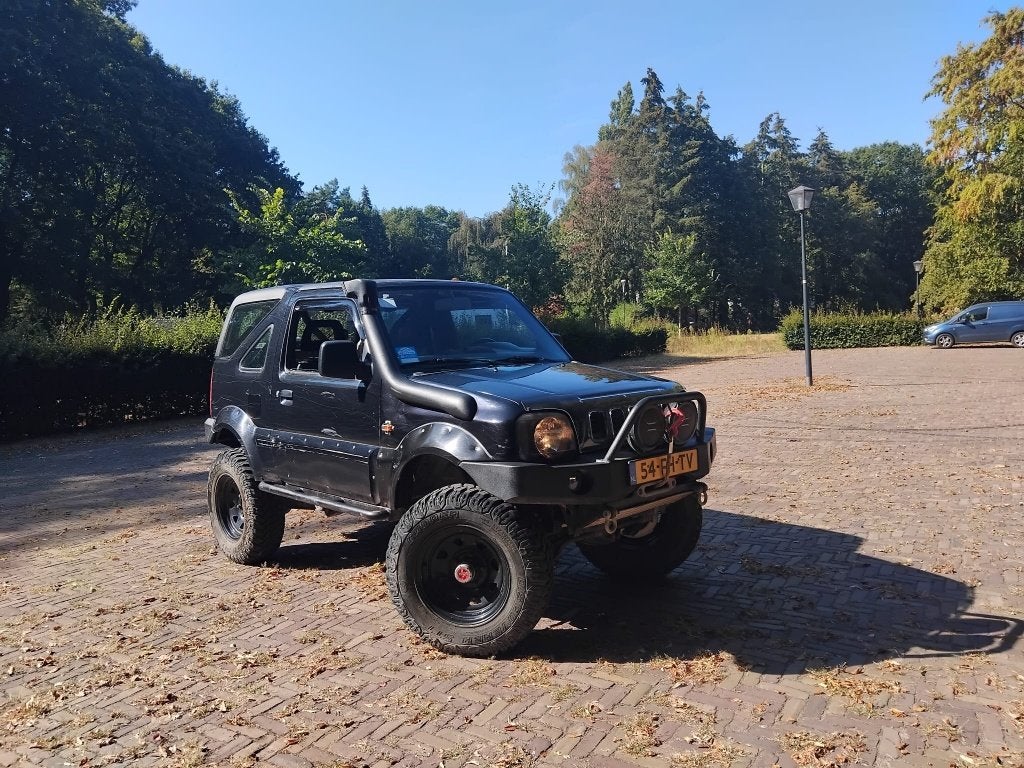 Suzuki Jimny 1.3 Cabrio 4WD 2000 Zwart, Auto's, 40 €/maand, Zwart, 4 cilinders, Zwart