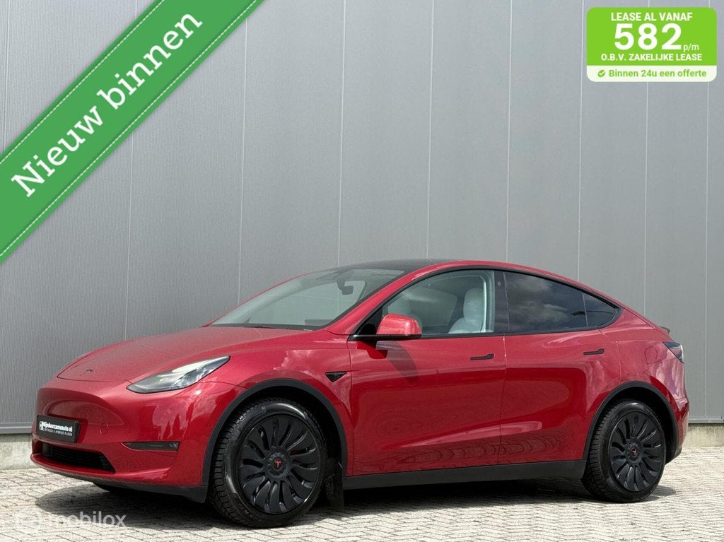 Tesla Model Y Long Range AWD 75 kWh | wit interieur SOH 94%, Auto's, Tesla, Automaat, Gebruikt, Navigatiesysteem, 351 pk