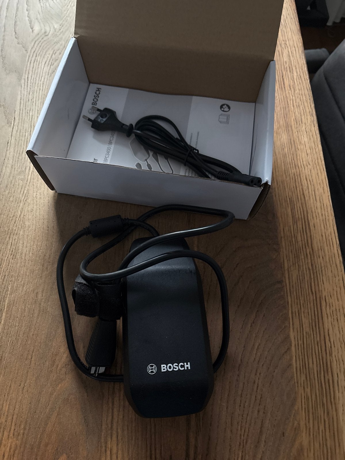 Bosch Smart System Lader 2A - E-bike Oplader, Fietsen en Brommers, Fietsaccessoires | Fietsaccu's, Ophalen, Nieuw