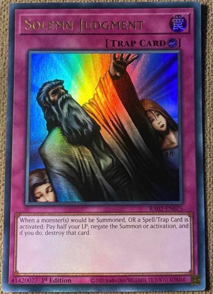 Yu-Gi-Oh! Solemn Judgment RA02 1st Edition !, Ophalen of Verzenden, Zo goed als nieuw, Losse kaart, Foil