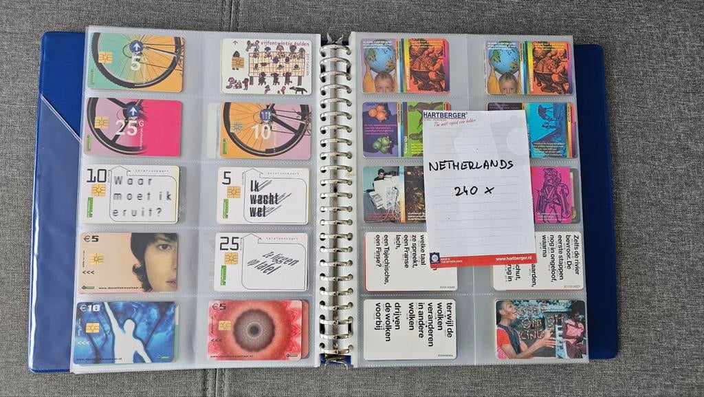 Verzameling telefoonkaarten (240 stuks) in album, Ophalen of Verzenden