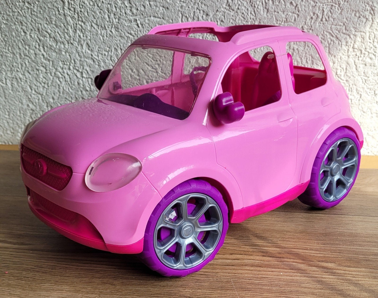 Roze speelgoedauto voor Barbie of poppen