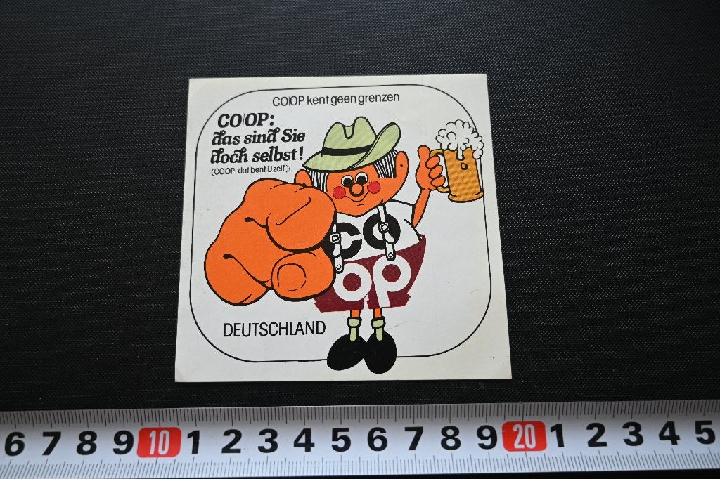 sticker supermarkt coop strip kent geen grenzen duitsland, Verzamelen, Ophalen, Zo goed als nieuw