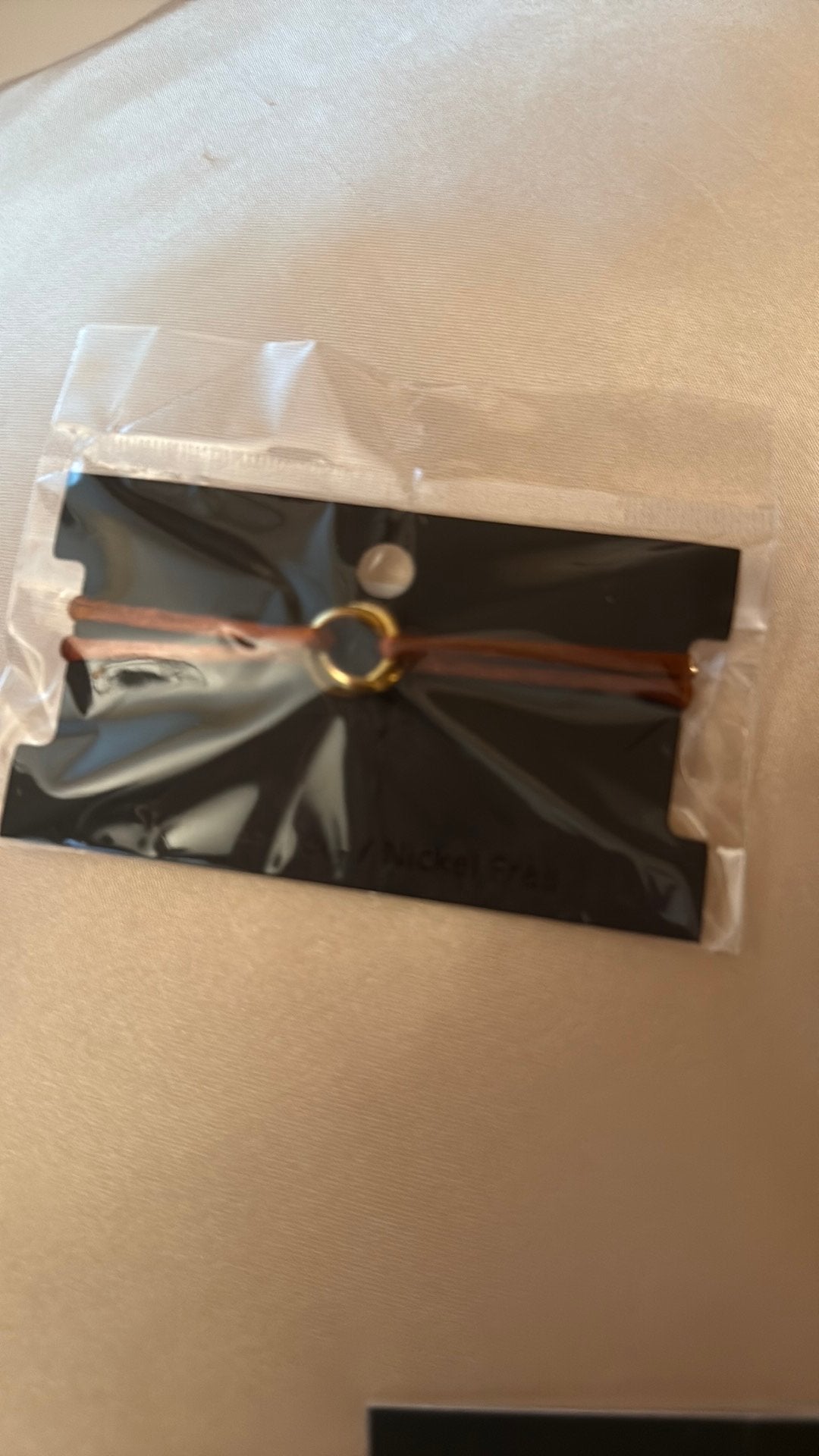 Diversen armbandjes en oorbellen, Ophalen of Verzenden, Nieuw, Overige kleuren, Leer