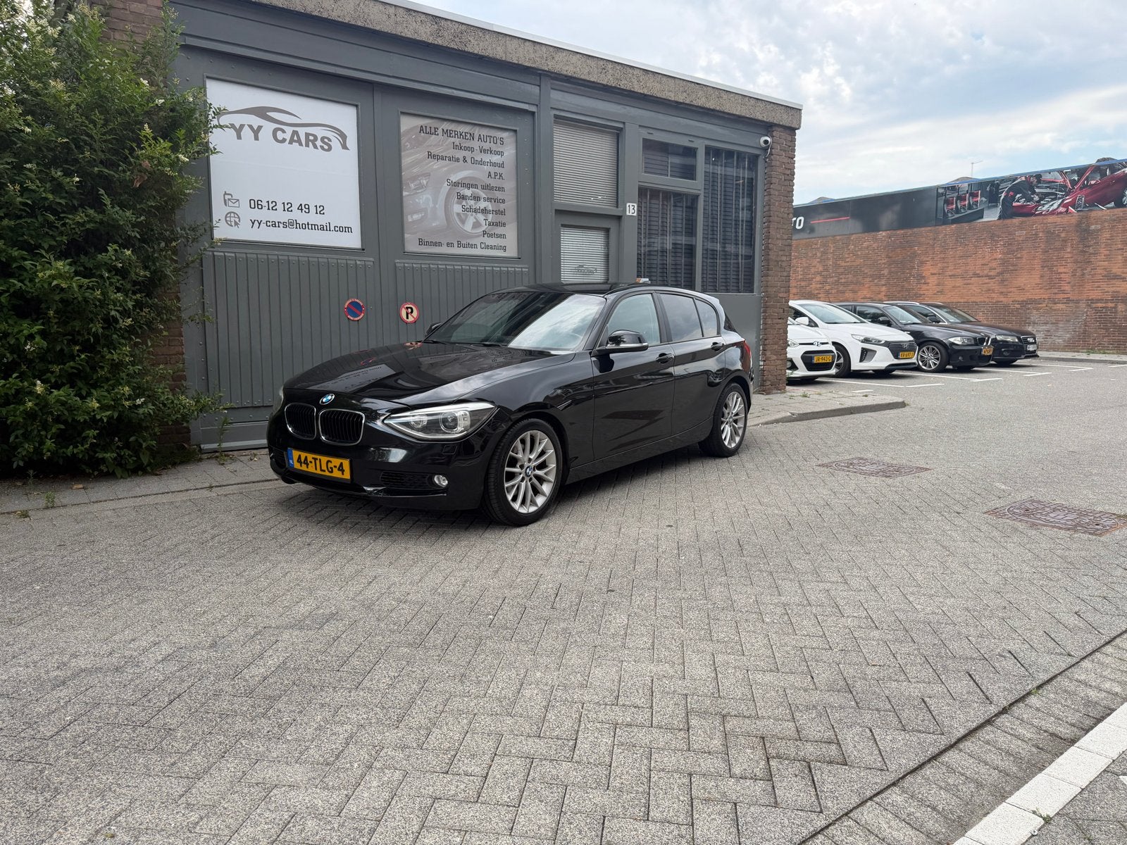 BMW 1-Serie 118I 170PK 5DR AUTOMAAT F20 BJ 2012, Auto's, BMW, Achterwielaandrijving, Zwart, 4 cilinders, 1290 kg