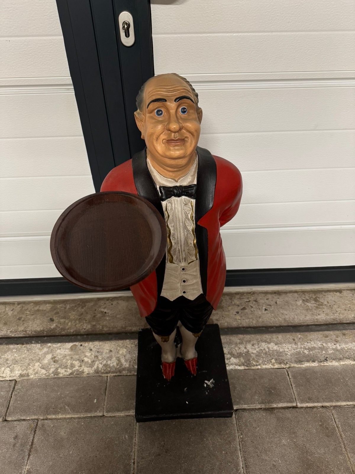 Vintage beeld butler, Ophalen
