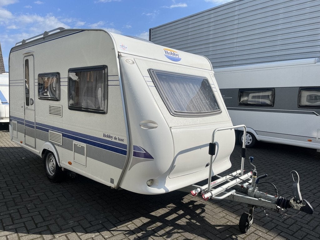Hobby 400 SF de Luxe met mover (bj 2009), Caravans en Kamperen, Bedrijf, 750 - 1000 kg, 5 tot 6 meter, Tot en met 4