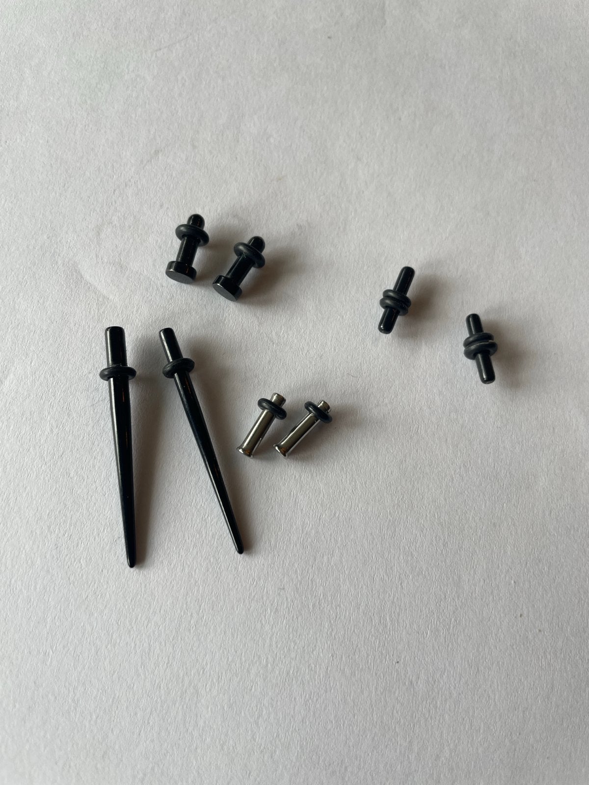 Stretch set 2-2.4mm: Tapers, tunnels en plugs, Ophalen of Verzenden, Zo goed als nieuw, Staal, Oor- of Traguspiercing