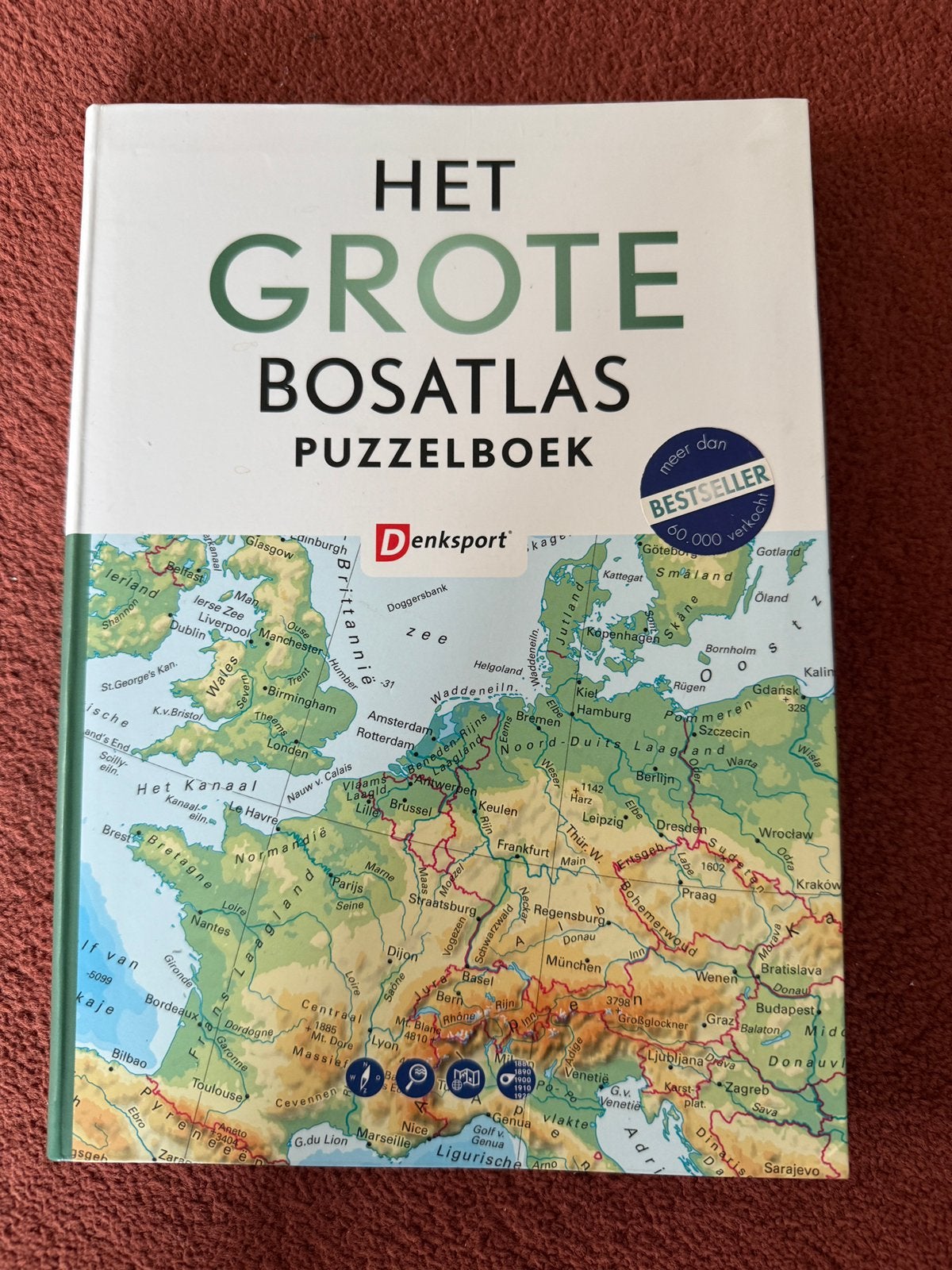 Het grote bosatlas puzzelboek van denksport, Ophalen of Verzenden, Zo goed als nieuw, Puzzelboek