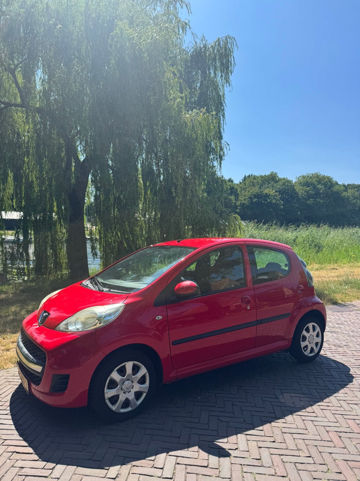 Peugeot 107 5DR 2010 Rood, Voorwielaandrijving, 4 stoelen, 68 pk, Origineel Nederlands