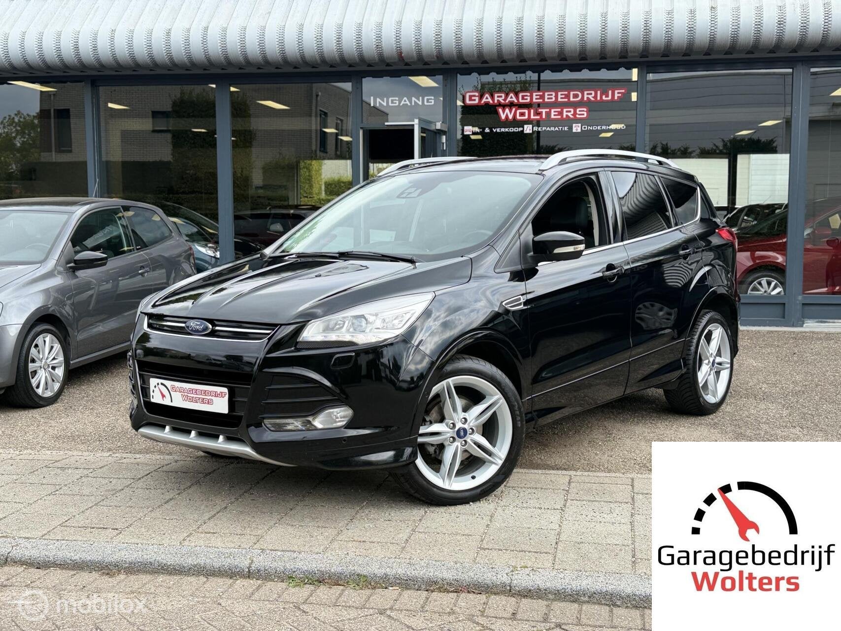 Ford Kuga 1.5 EcoBoost Titanium 150pk half leder vol opties, Auto's, Zwart, 4 cilinders, Leder en Stof, Zwart