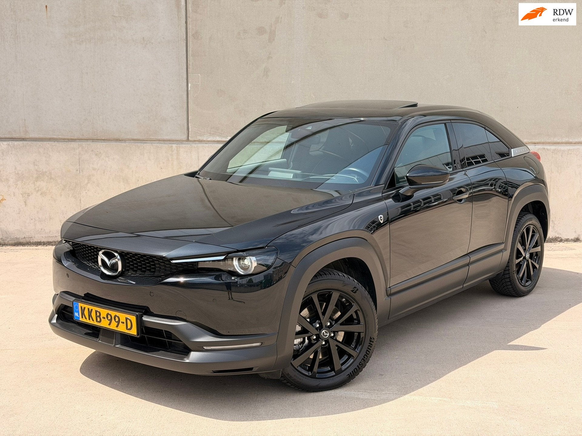 Mazda MX-30 E-SkyActiv R-EV 170 Makoto Open dak 360 BOSE HUD, Gebruikt, Leder en Stof, Plug-in hybride, Bedrijf