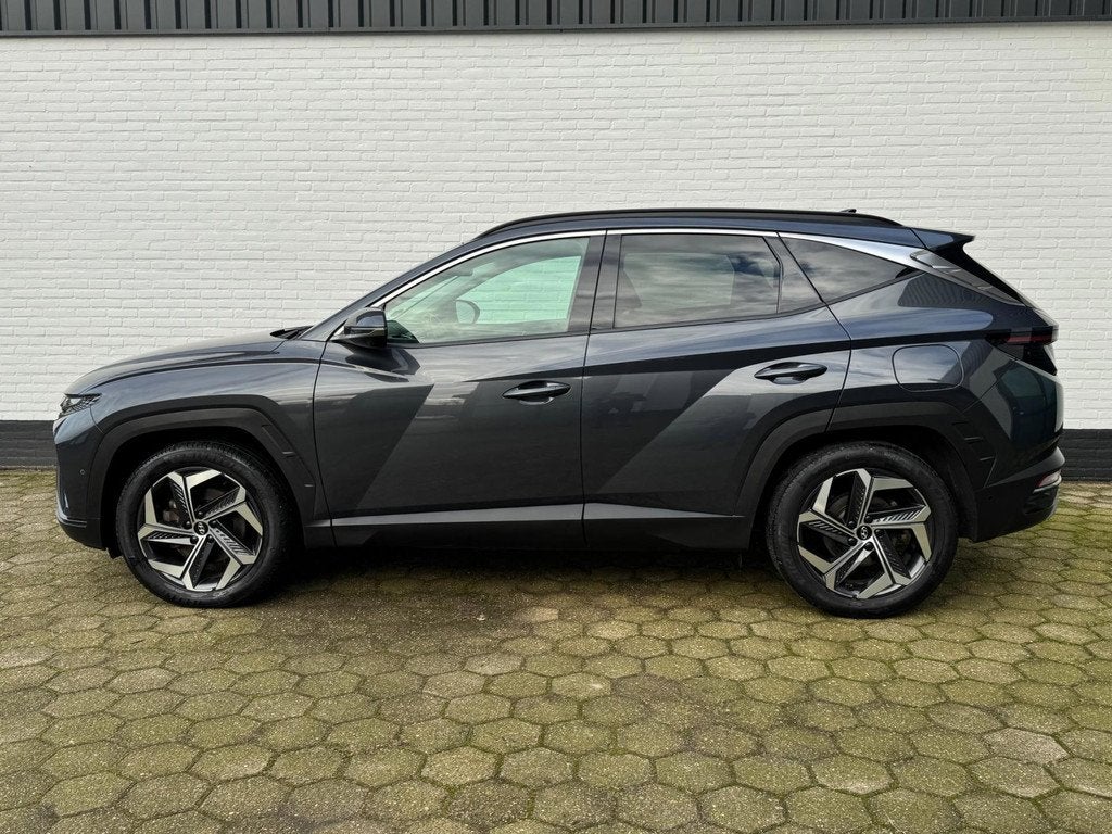 Hyundai TUCSON 1.6 T-GDI PHEV Premium 4WD l LEDER l TREKHAAK, Auto's, Hyundai, Automaat, 1350 kg, Gebruikt, 4 cilinders