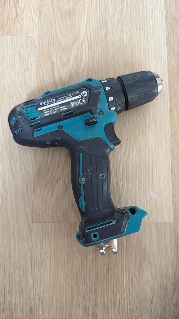 Makita DF331D accuboormachine (10.8V / 12V CXT), Ophalen of Verzenden, Gebruikt, Boor- en Schroefmachine, Variabele snelheid