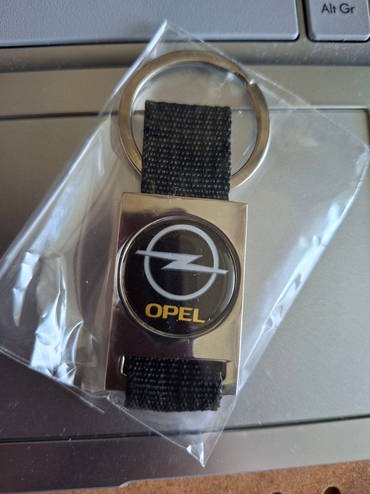 Opel zilver zwart, Verzamelen, Sleutelhangers, Ophalen of Verzenden, Zo goed als nieuw, Merk