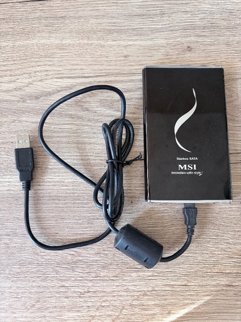 MSI Starbox SATA – externe harde schijf behuizing (320GB), Ophalen of Verzenden, Gebruikt, Laptop, USB