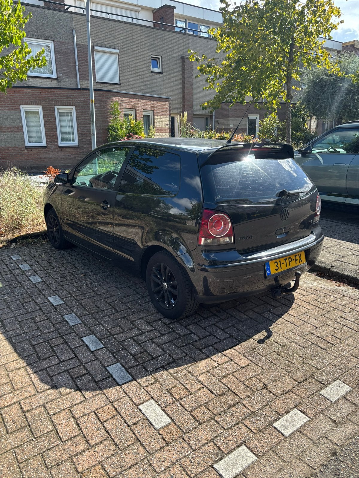 Volkswagen Polo 1.4 16V 59KW 2006 Zwart, Auto's, Volkswagen, Voorwielaandrijving, 4 cilinders, Zwart, Handgeschakeld