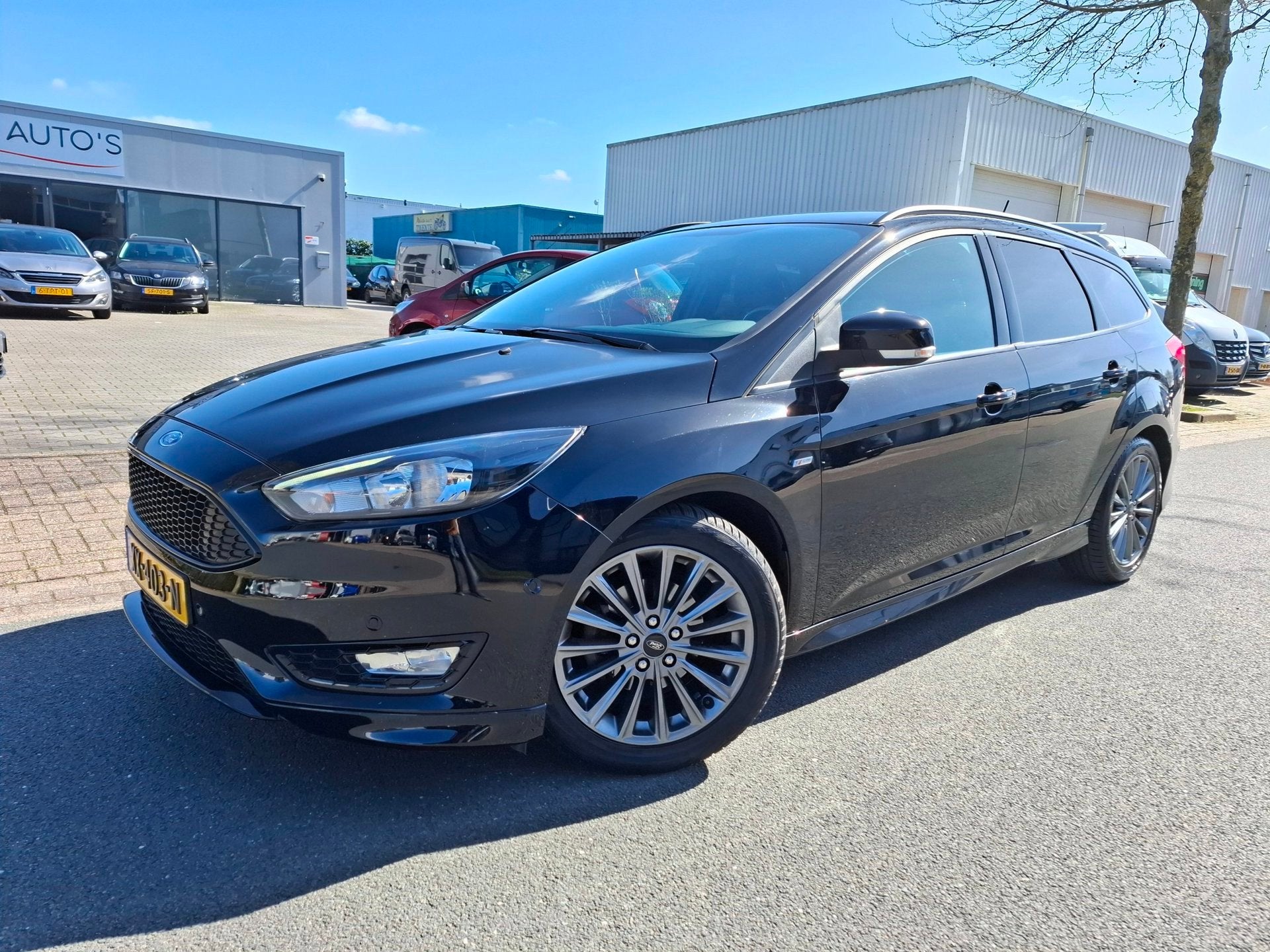 Ford Focus Wagon 1.0 ST LINE NAVI/CLIMA/CRUISE/PDC/BLACK!, Stof, Gebruikt, Zwart, Handgeschakeld