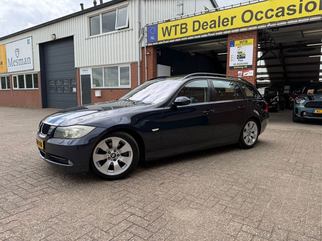 BMW 3-serie Touring 320i High Executive Dealer oh. Trekhaak,, Automaat, Achterwielaandrijving, Zwart, 4 cilinders