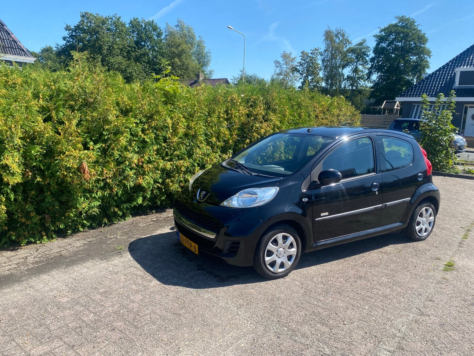 Peugeot 107 1.0 12V 5DR 2011 Zwart Airco, Auto's, Voorwielaandrijving, Stof, Zwart, Elektrische ramen