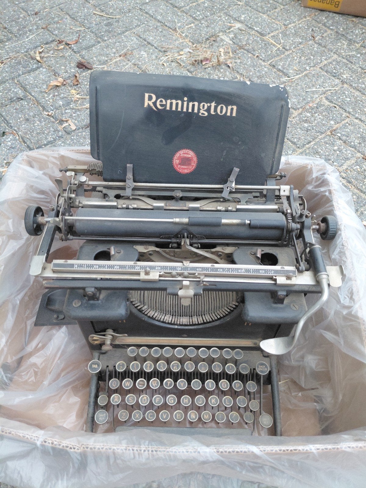 REMMINGTON TYPEMACHINE, Ophalen