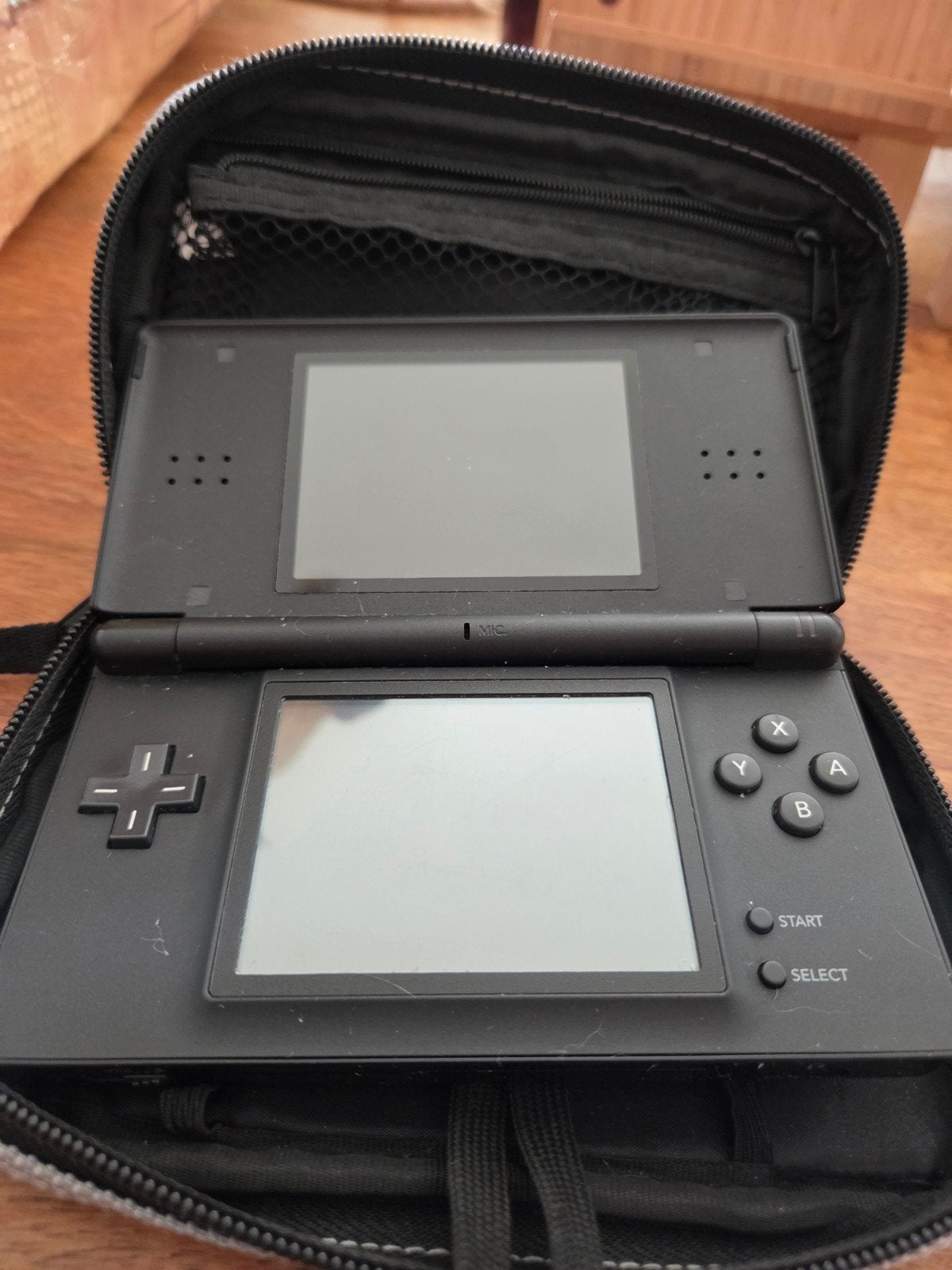 Nintendo DS lite Zwart met beschermhoes, Spelcomputers en Games, Gebruikt, Zwart, Ophalen of Verzenden, Met beschermhoes of tas