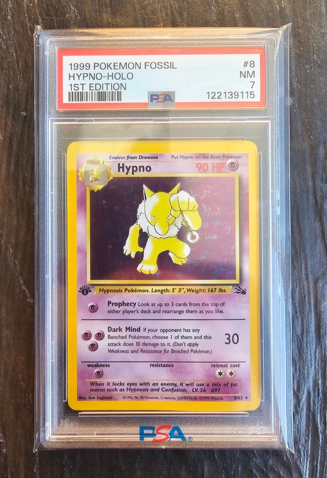 Hypno 8/62 1st edition PSA 7 Fossil Set 🪀, Ophalen of Verzenden, Nieuw, Losse kaart, Foil
