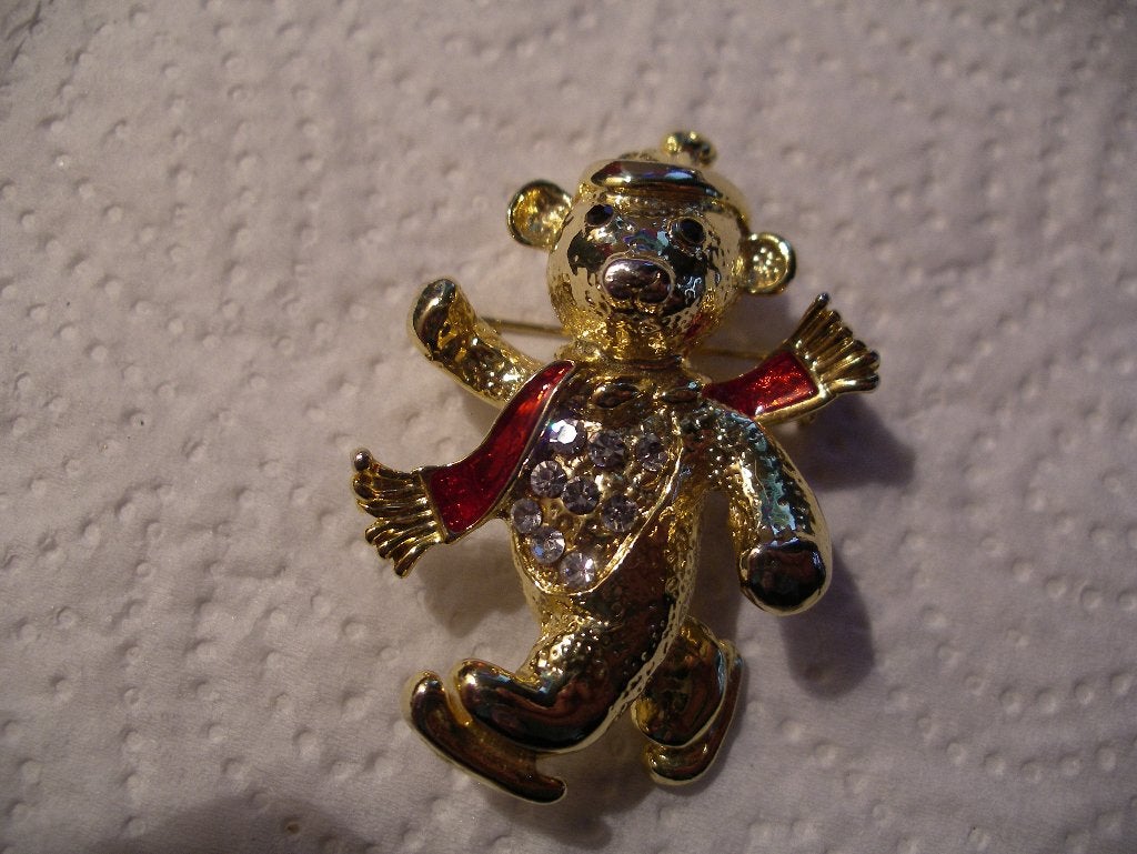 Een Leuke Goudkleurige Winter Broche van Beer op Schaatsen, Verzenden, Zilver, Broche, Met edelsteen