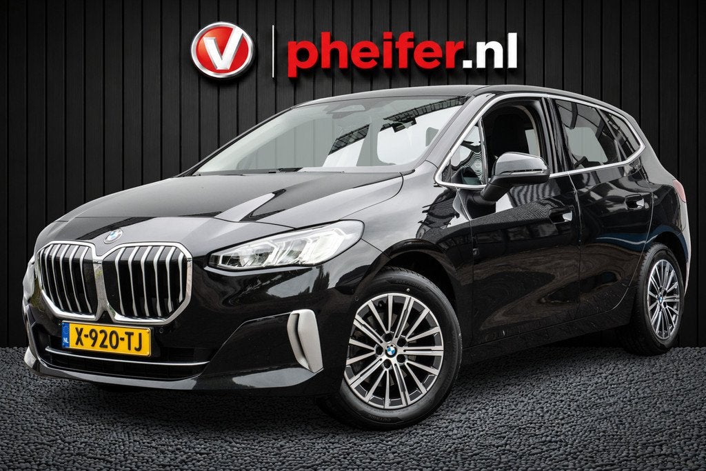 BMW 2 Serie Active Tourer 218i 136pk Aut. Luxury line Trekha, Auto's, BMW, 136 pk, Gebruikt, Met garantie (alle), 1445 kg