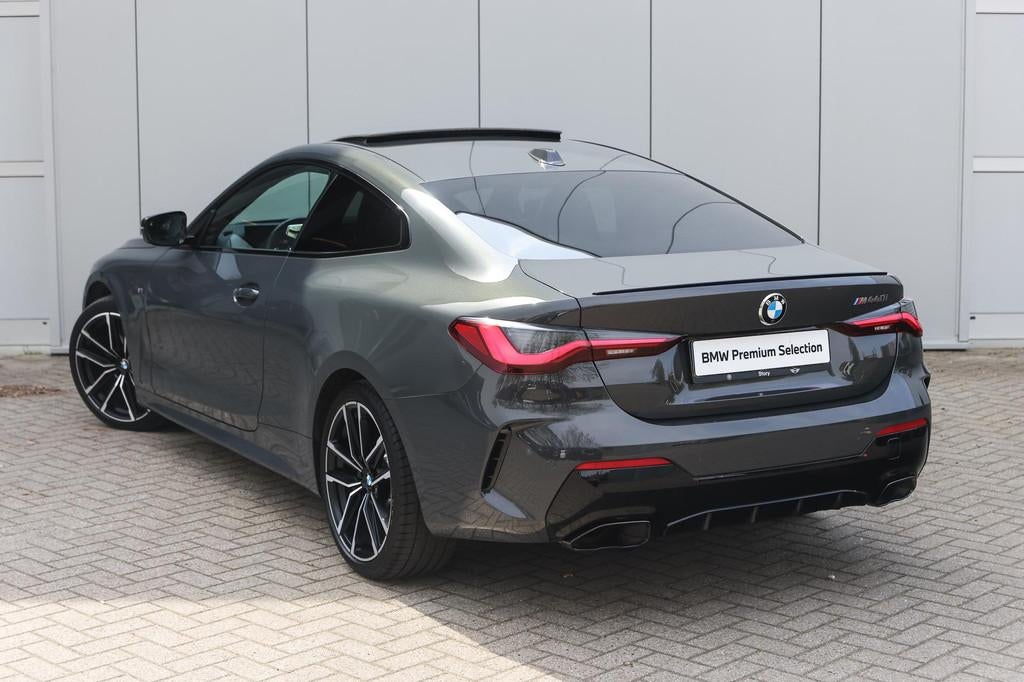 BMW 4 Serie Coupé M440i xDrive High Executive M Sport Autom, Auto's, BMW, Open dak, Euro 6, Met garantie (alle), 4 stoelen