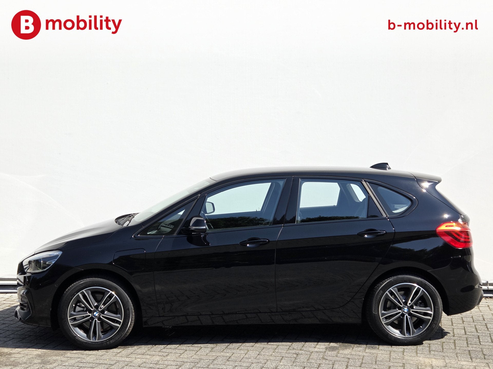 BMW 2 Serie Active Tourer 225xe PHEV Hybride High Executive, Auto's, Gebruikt, Leder en Stof, Zwart, Bedrijf
