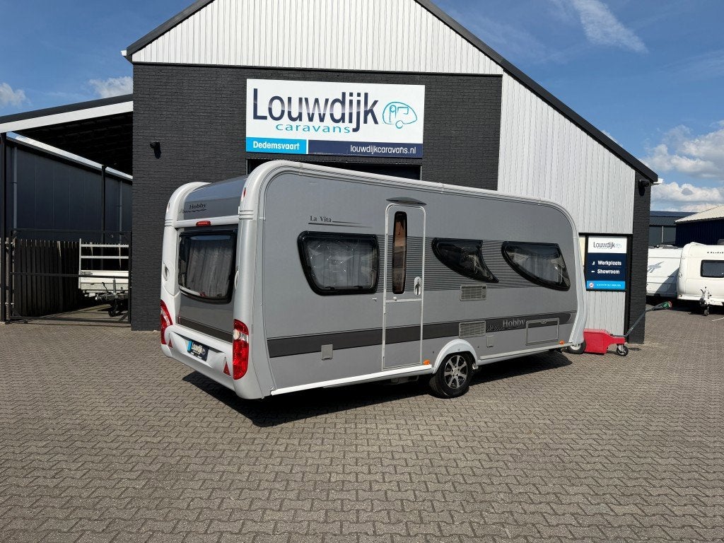 HOBBY La Vita 495 UL ’10 (Mover, Enkele Bedden), Rondzit, Hobby, 7 tot 8 meter, Bedrijf