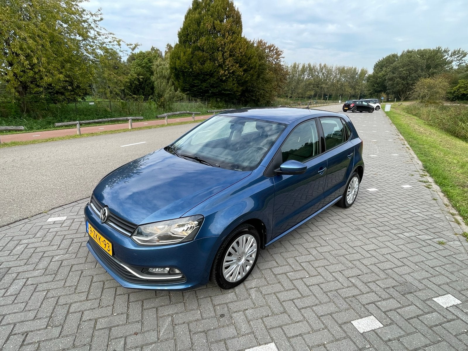 Volkswagen Polo 1.2 TSI 66KW 2015 Blauw, Auto's, Stof, 40 €/maand, 4 cilinders, Blauw